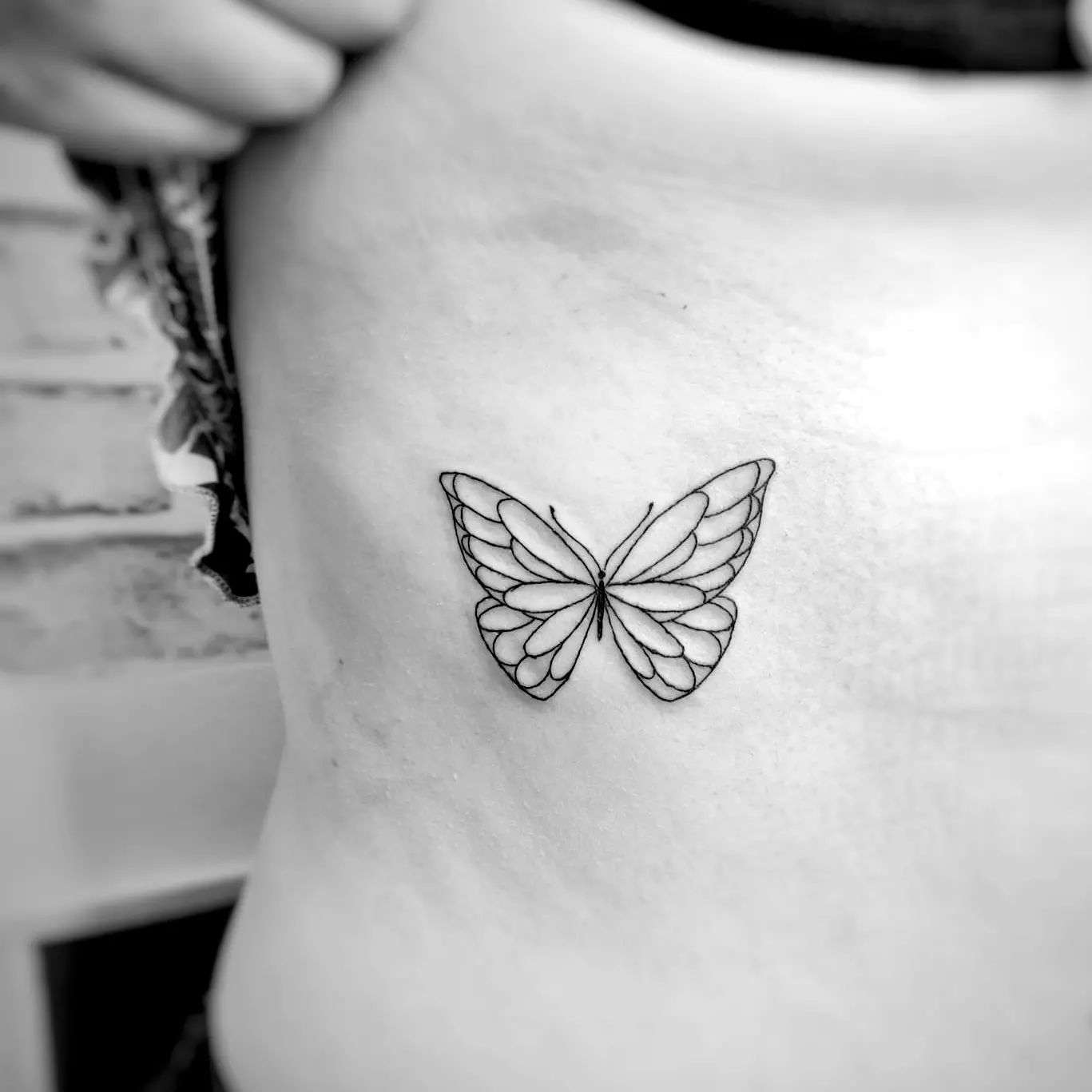 Tatuajes de mariposa minimalistas
