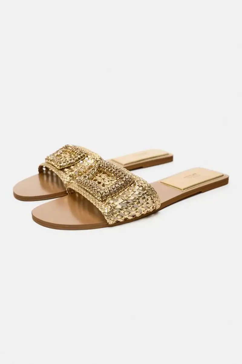 Sandalias doradas con tejido trenzado