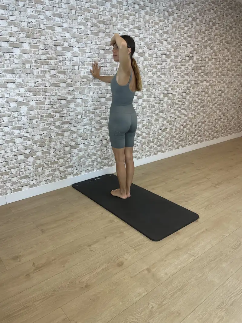 pilates en pared Rotación de Columna