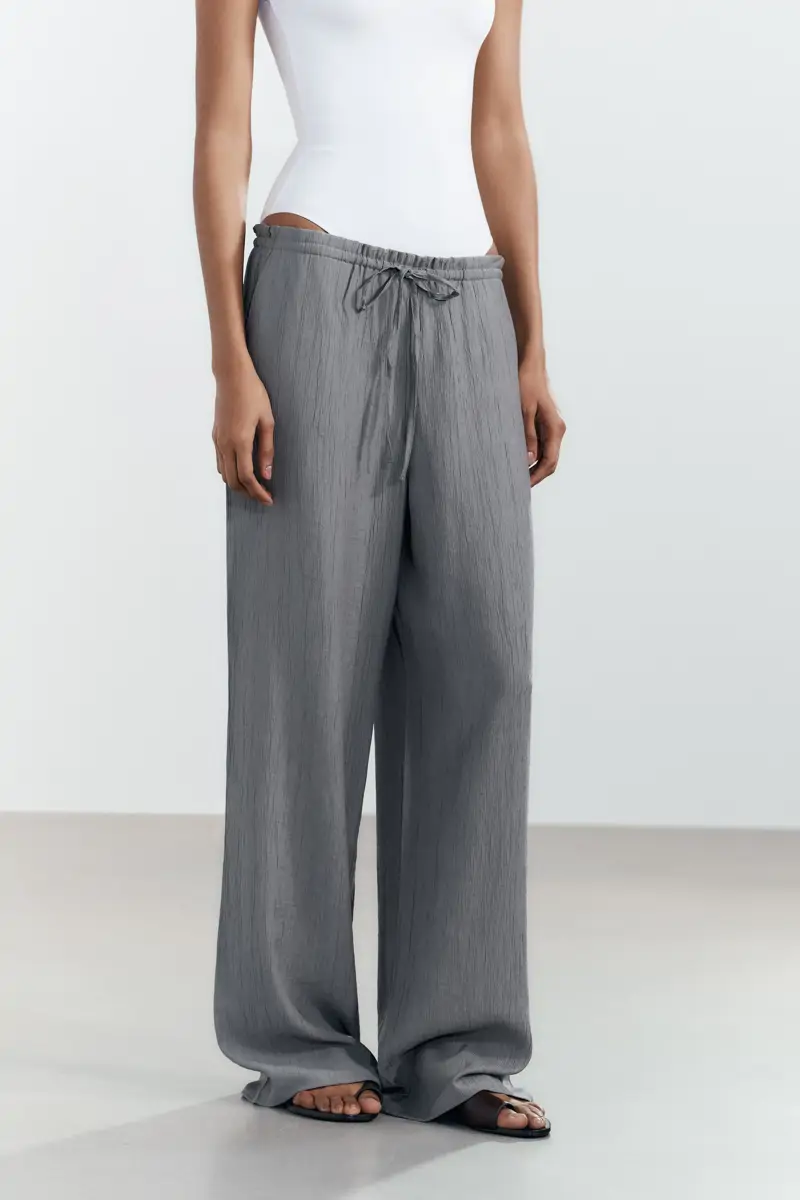pantalon arrugado zara
