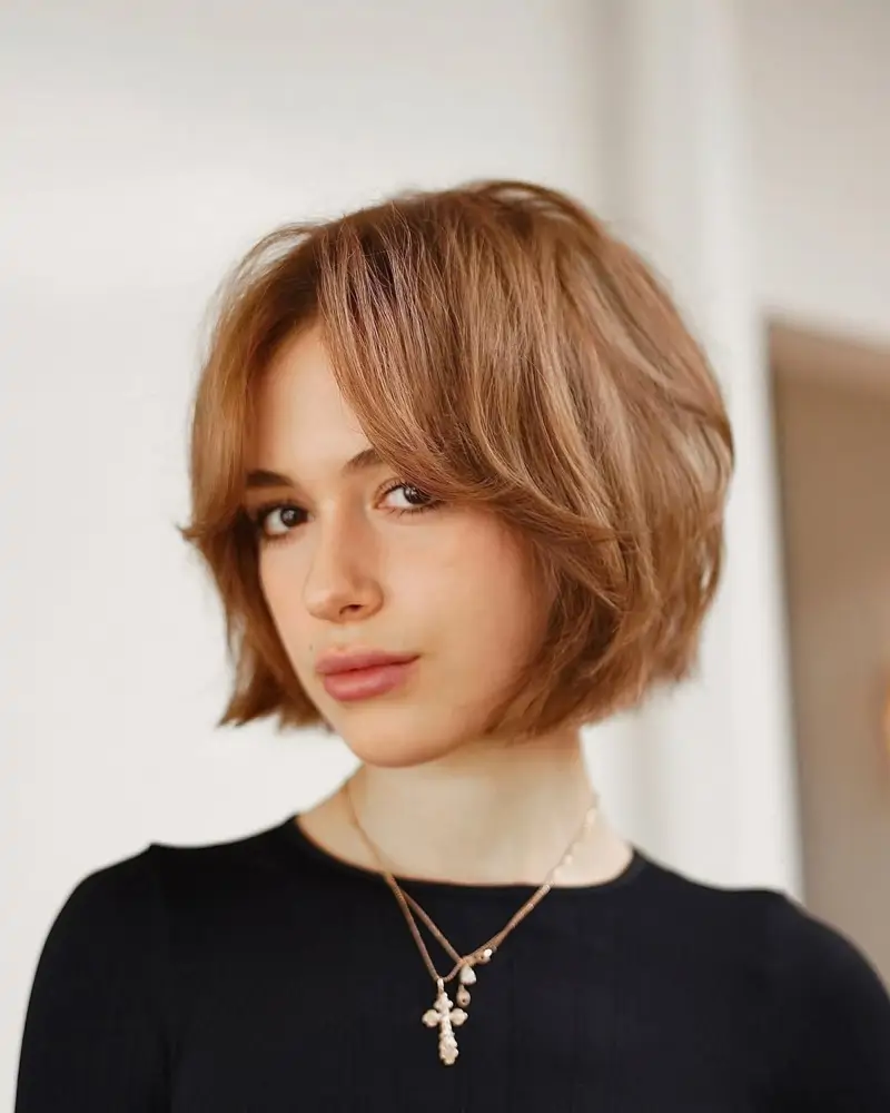 melenas cortas modernas con flequillo Microbob con flequillo cortina desfilado