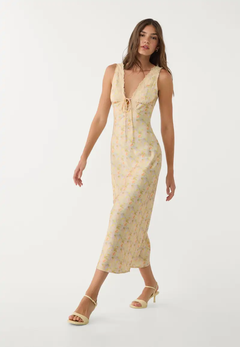 vestido amarillo estampado stradivarius